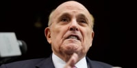 Rudy Giuliani speaks to reporters in New York